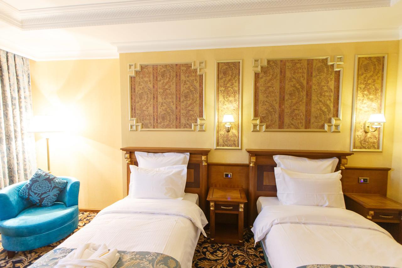 Sultan Palace Hotel Атырау Экстерьер фото A room at the hotel